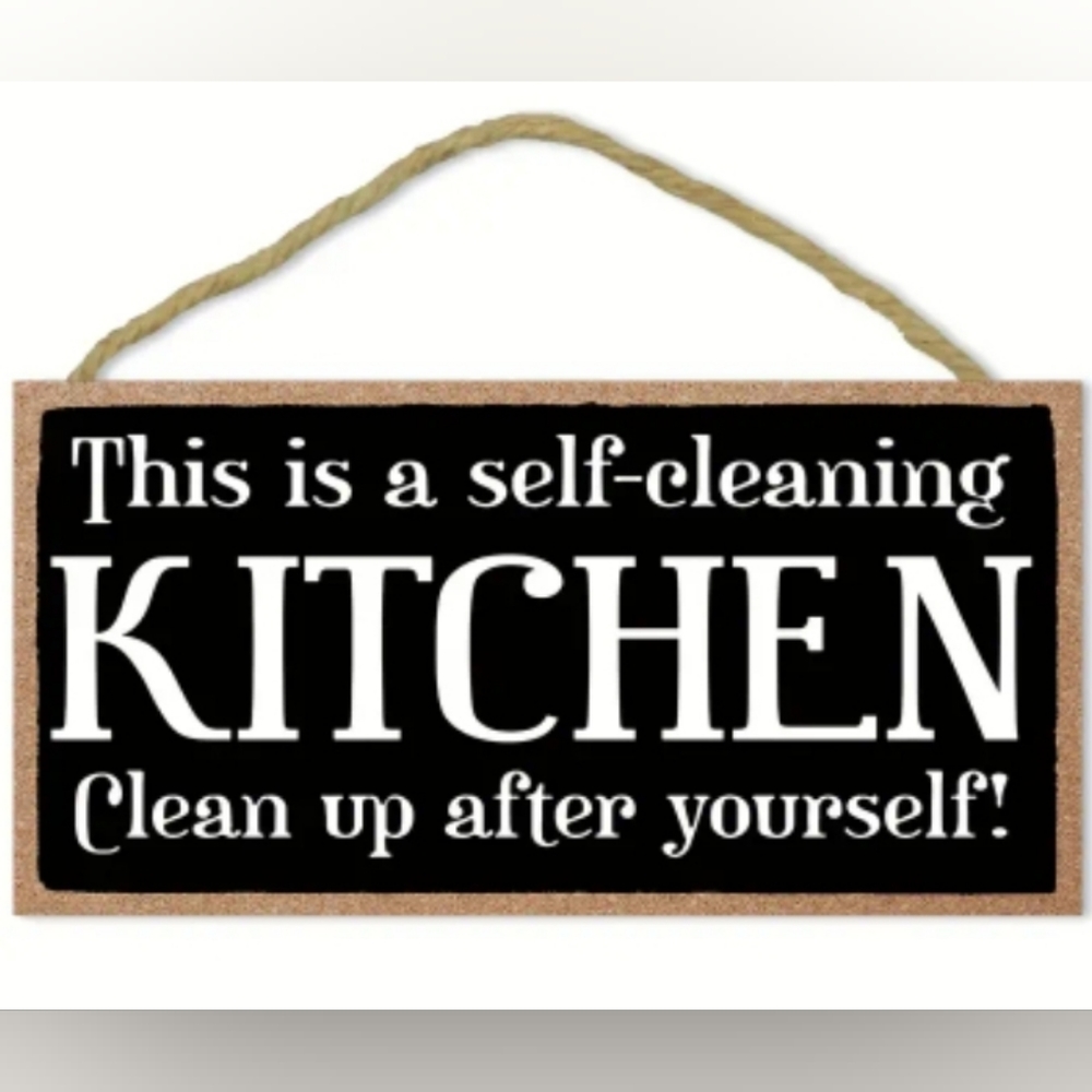 "This is a self-cleaning kitchen..." wooden sign